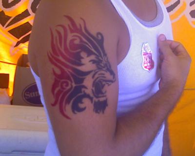 Airbrush Tribal Lion Head Tattoo On Man Right Shoulder