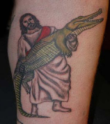 Alligator In Jesus Hand Tattoo Design
