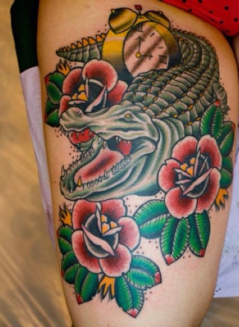Alligator With Flowers And Clock Tattoo On Thigh