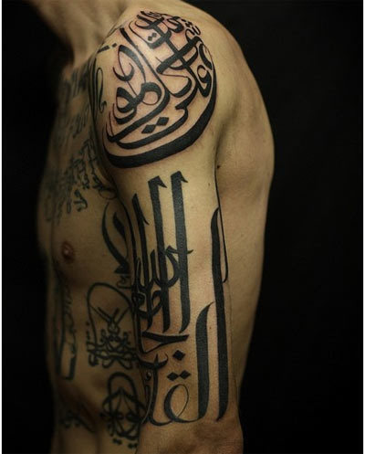 Arabic Tattoo On Man Left Half Sleeve