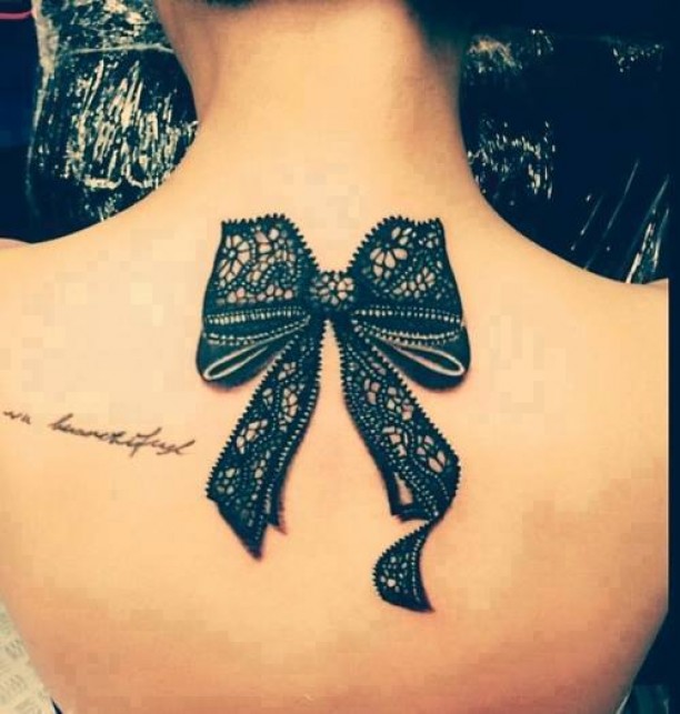 Awesome Black 3D Lace Bow Tattoo On Upper Back
