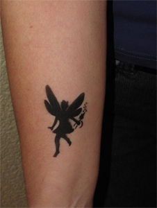 Black Airbrush Fairy Tattoo Design For Forearm