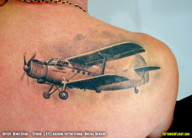 Black And Grey 3D Airplane Tattoo On Right Back Shoulder