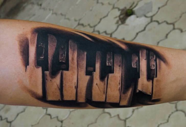 Black And Grey 3D Piano Keyboard Tattoo Design For Arm