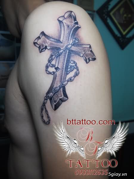 Black And Grey 3D Rosary Cross Tattoo On Shoulder