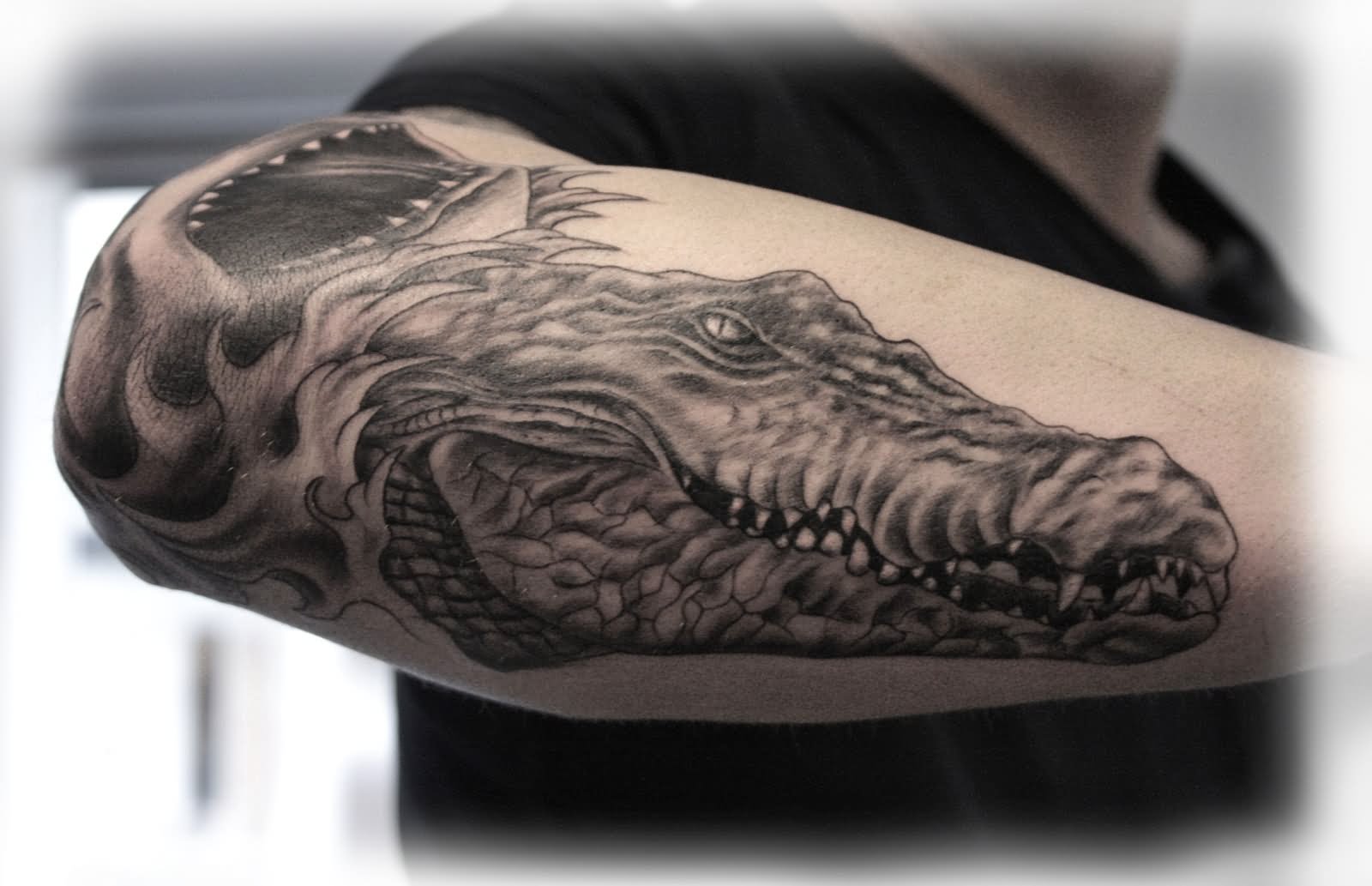Black And Grey Alligator Head Tattoo On Forearm