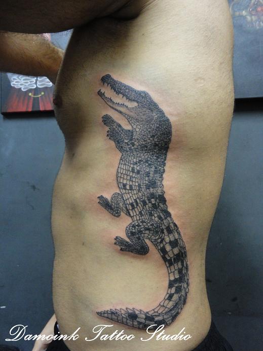 Black And Grey Alligator Tattoo On Man Side Rib