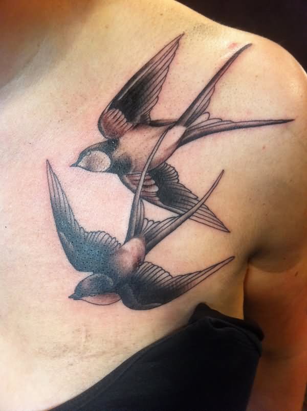 Black And Grey Two Flying Birds Tattoo On Left Front Shoulder