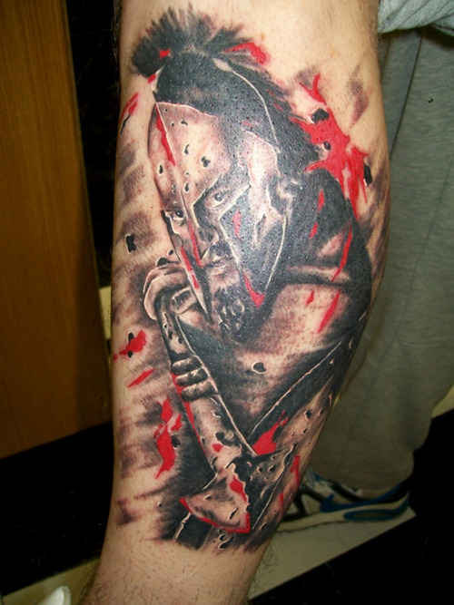 Black And Grey Warrior Helmet Tattoo On Leg