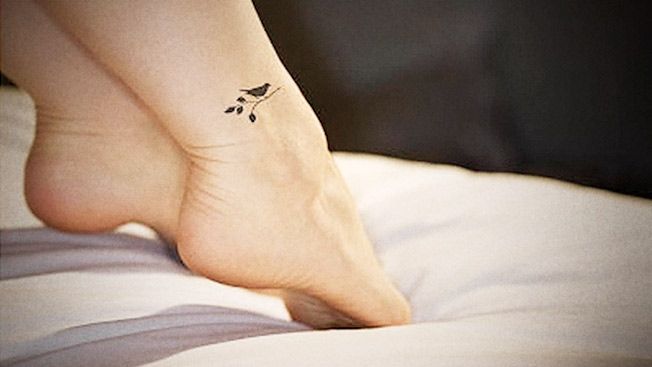 Black Bird Sit On Branch Tattoo On Leg