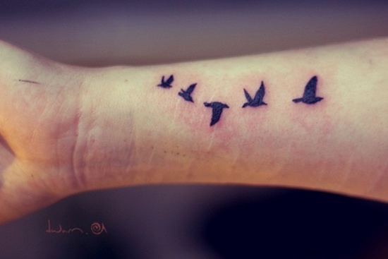 Black Five Flying Birds Tattoo On Wrist