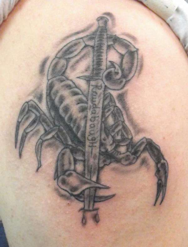 Black Ink 3D Scorpion With Sword Tattoo Design