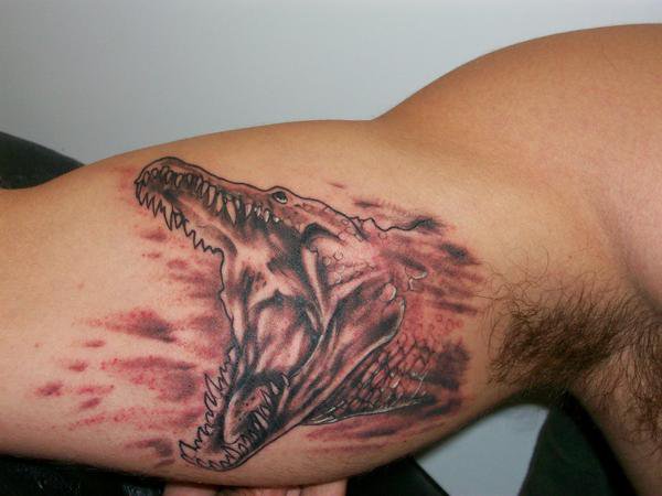 Black Ink Alligator Head Tattoo On Bicep