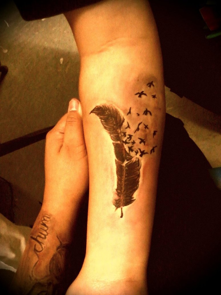 Black Ink Feather With Flying Birds Tattoo On Forearm