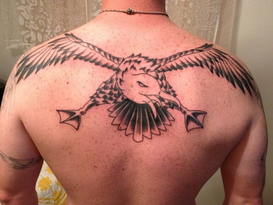 Black Ink Flying Albatross Tattoo On Upper Back