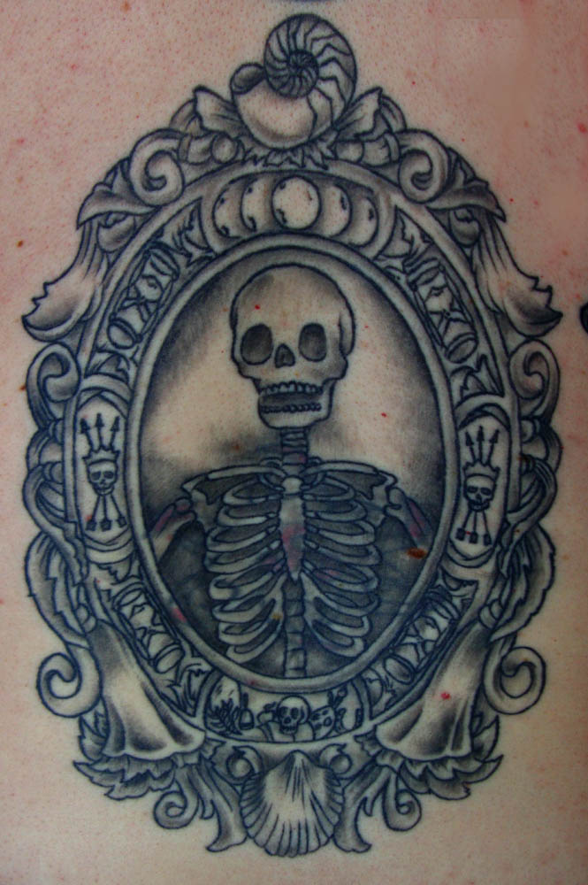 Black Ink Skeleton In Frame Tattoo Design