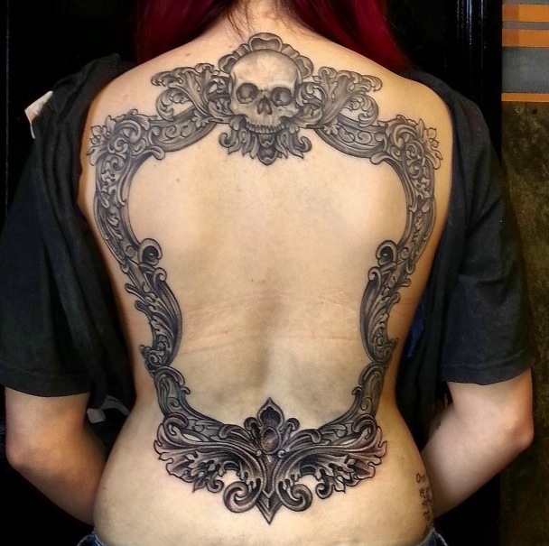 Black Ink Skull Frame Tattoo On Full Back