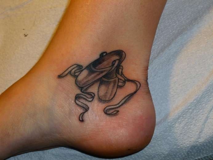 Black Ink Two Slipper Tattoo On Ankle