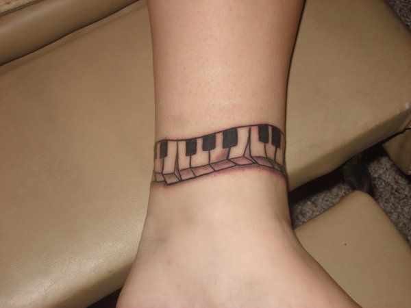 Black Music Keyboard Tattoo Design For Leg