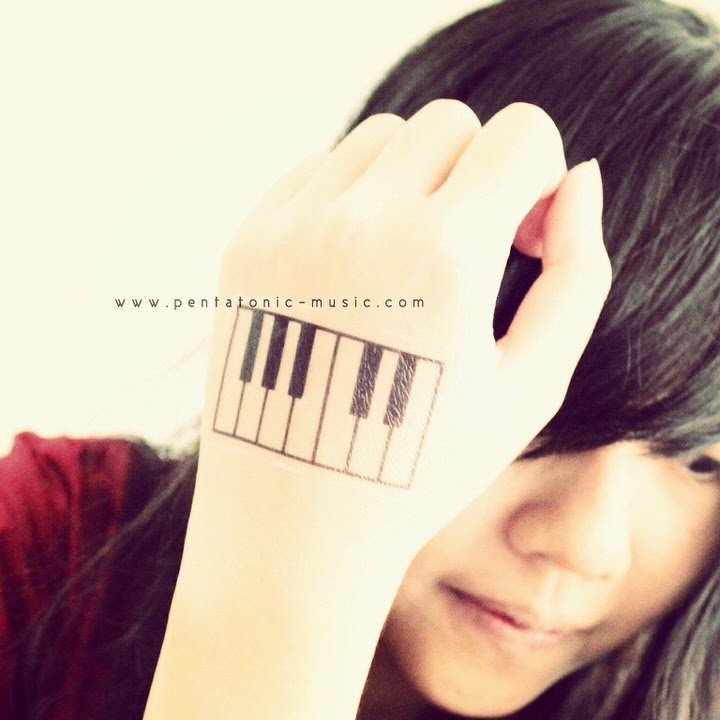 Black Music Keyboard Tattoo On Girl Hand