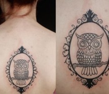 Black Owl In Frame Tattoo On Upper Back