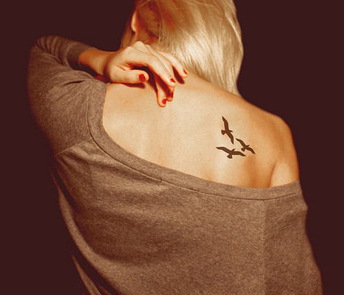 Black Three Flying Birds Tattoo On Girl Right Back Shoulder