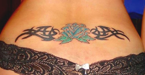 Black Tribal And Rose Flower Tattoo On Waist