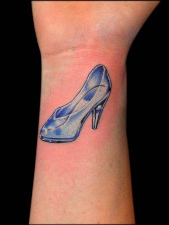 Blue Ink Girl Slipper Tattoo On Wrist
