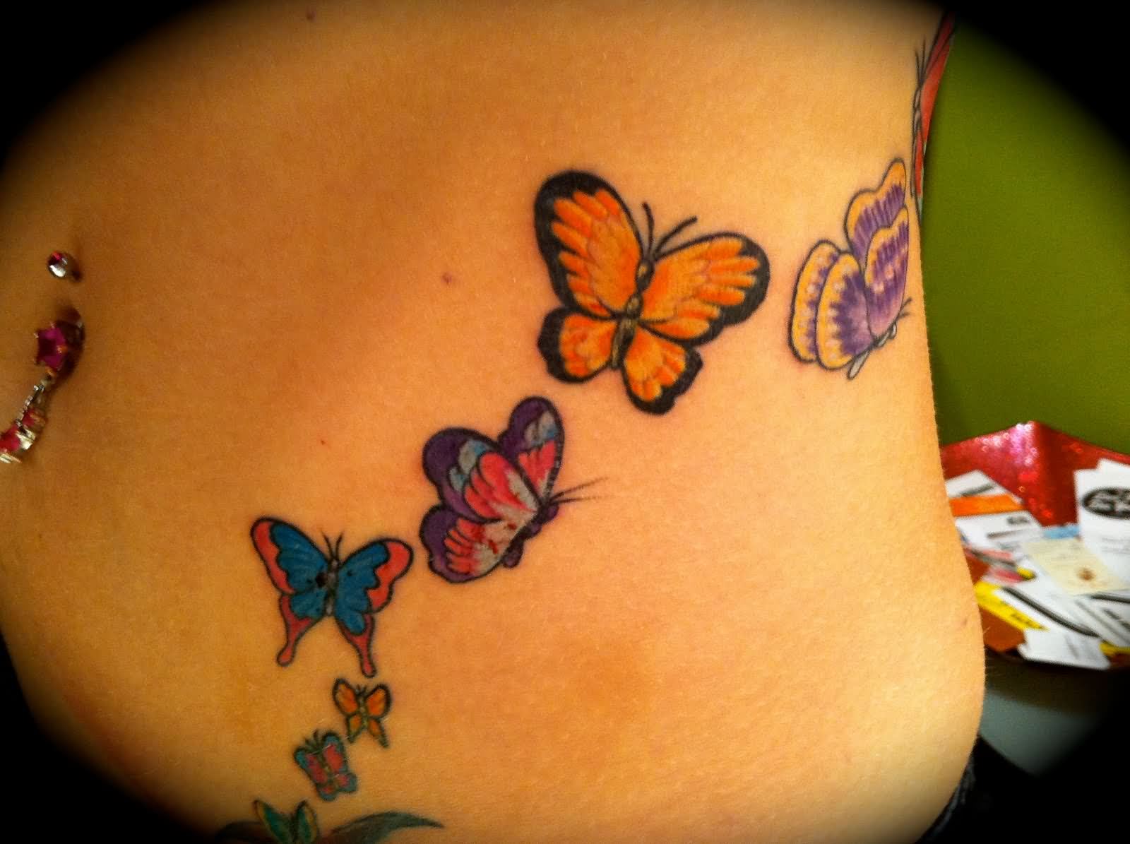 Colored Flying Butteries Tattoos On Waist