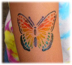 Colorful Airbrush Butterfly Tattoo Design For Arm