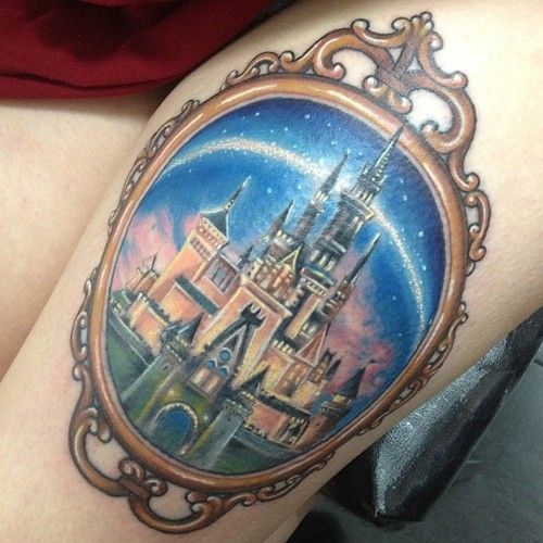 Colorful Disney Castle In Frame Tattoo On Thigh