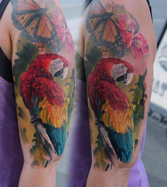 Colorful Parrot With Butterfly Tattoo On Half Sleeve By Piranha
