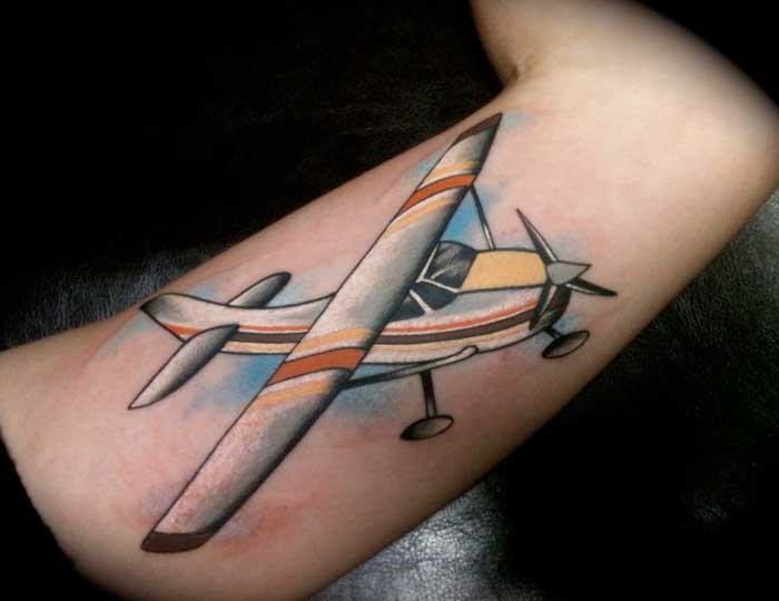 Colorful Sea Airplane Tattoo Design For Bicep