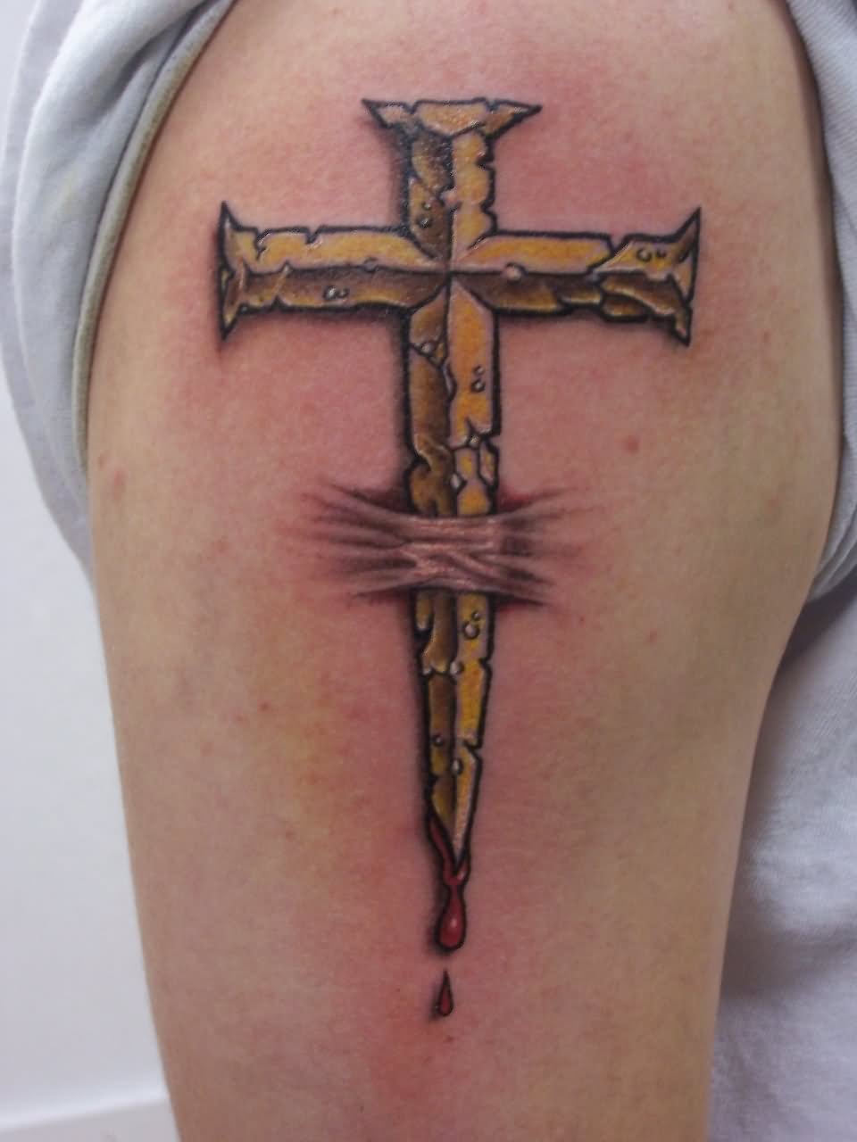 Cool 3D Ripped Skin Cross Tattoo Design For Shoulder