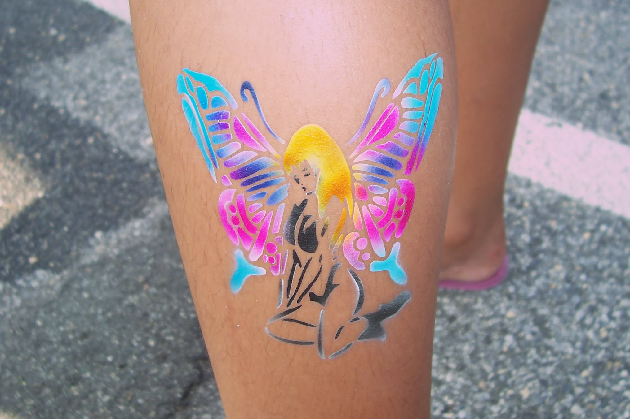 Cute Airbrush Girl With Butterfly Wings Tattoo On Leg