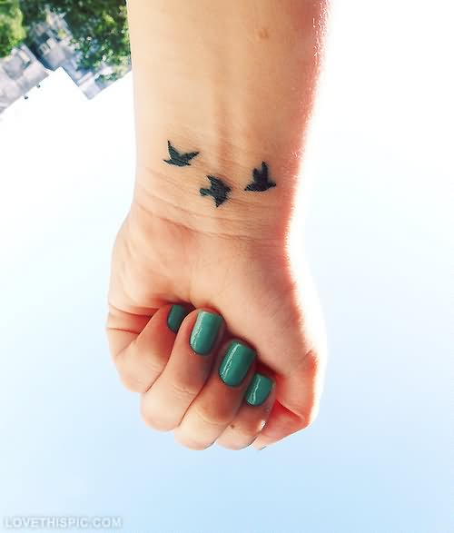 Cute Birds Tattoos On Wrist For Young Girls