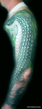 Cute Green Ink Alligator Tattoo On Left Full Sleeve
