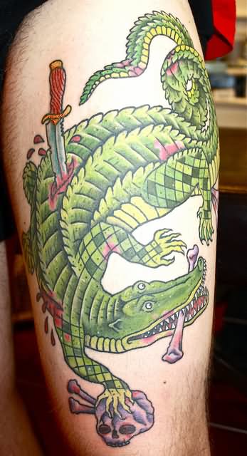 Dagger In Alligator Tattoo Design For Thigh