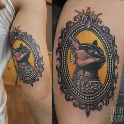 Egyptian Cat Statue In Frame Tattoo On Right Half Sleeve