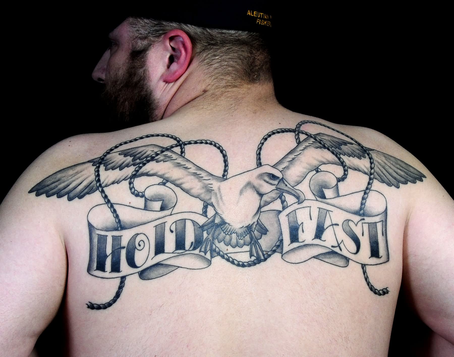 Flying Albatross With Banner Tattoo On Man Upper Back