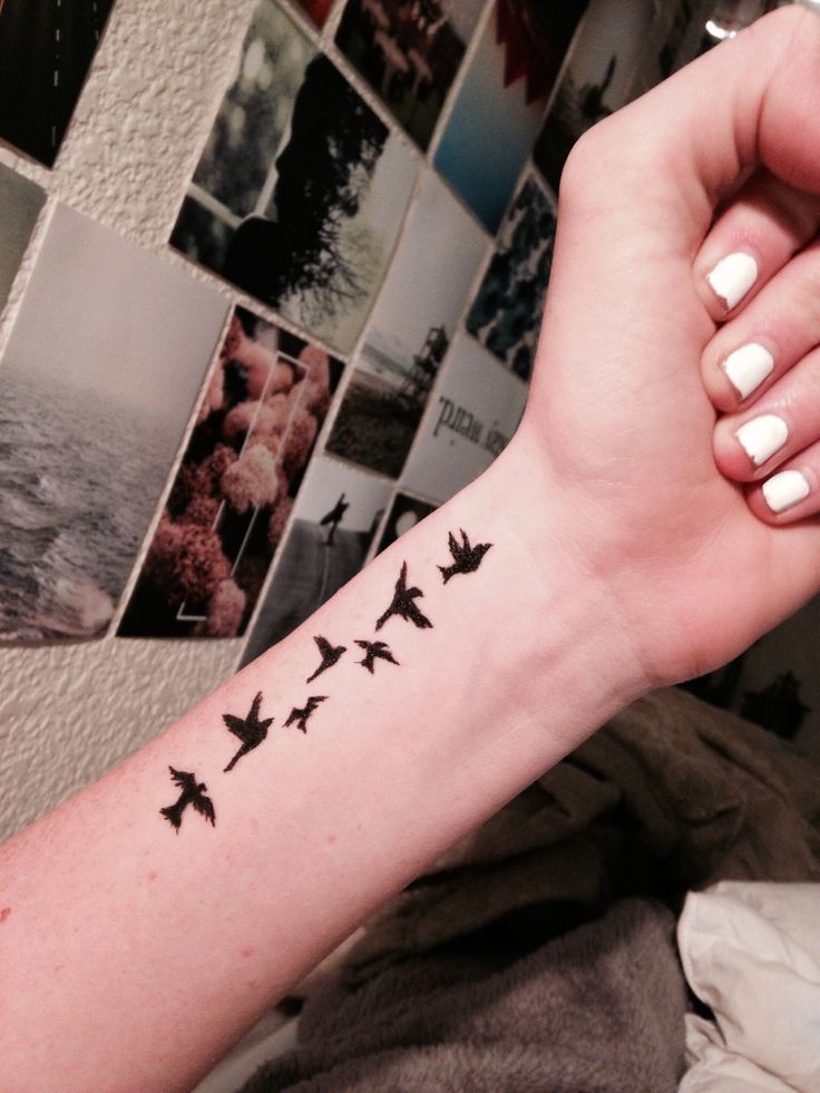 Flying Black Birds Tattoos on Wrists Tattoos