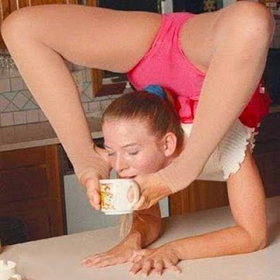Girl Drinking Tea In Funny Gymnastic Pose