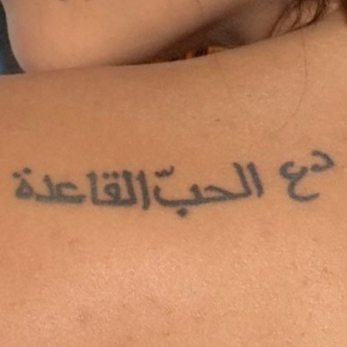 Girl Left Back Shoulder Arabic Tattoo