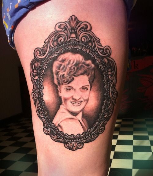 Girl Portrait In Frame Tattoo On Thigh