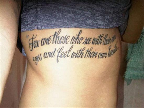 Girl Showing Her Side Rib Quote Tattoo