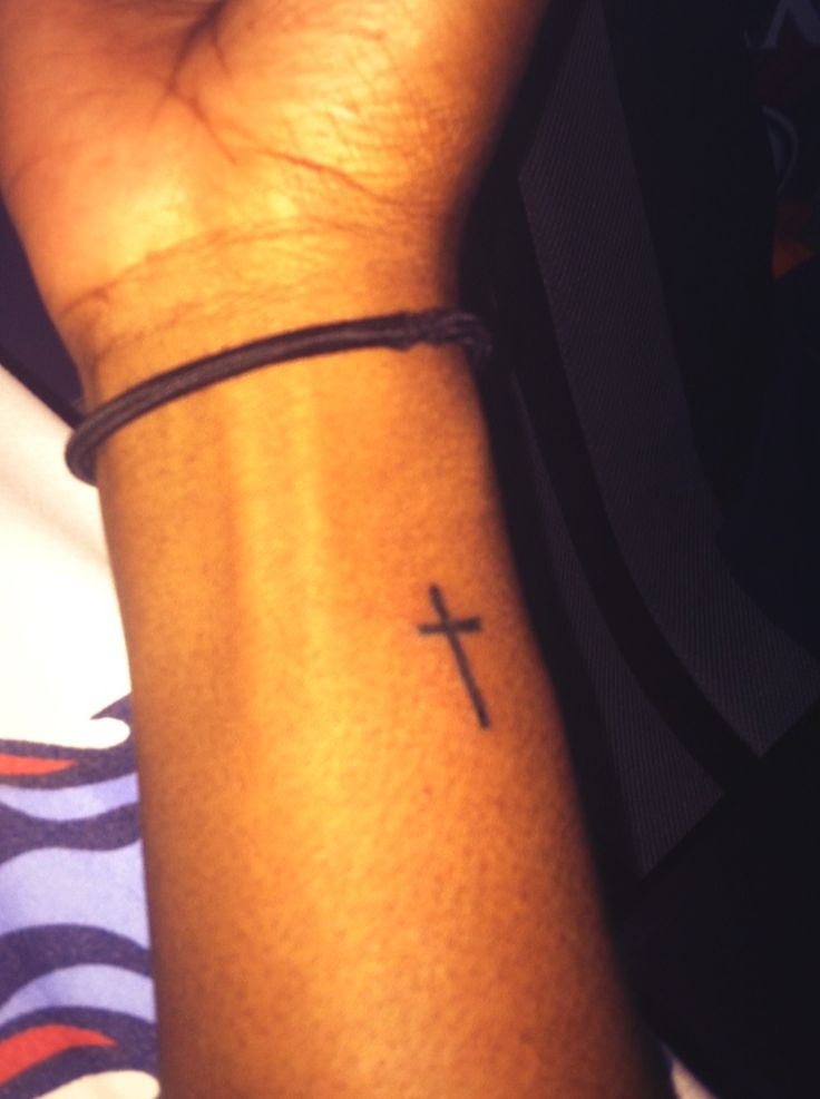 Girl With Black Cross Wrist Tattoo