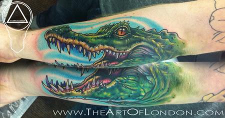 Green Ink Alligator Head Tattoo On Forearm
