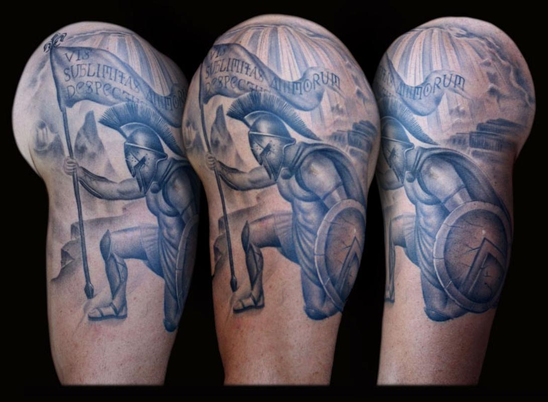 Grey Ink Spartan Tattoo Design For Shoulder