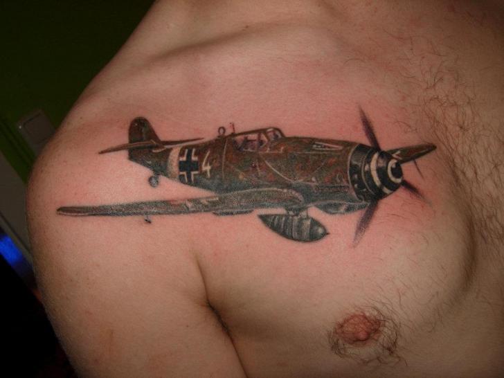 Impressive Airplane Tattoo On Man Left Front Shoulder