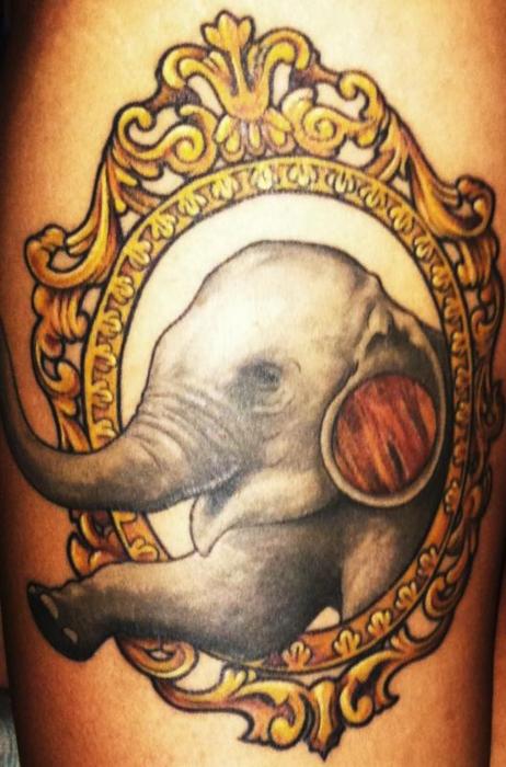 Impressive Elephant In Frame Tattoo Design